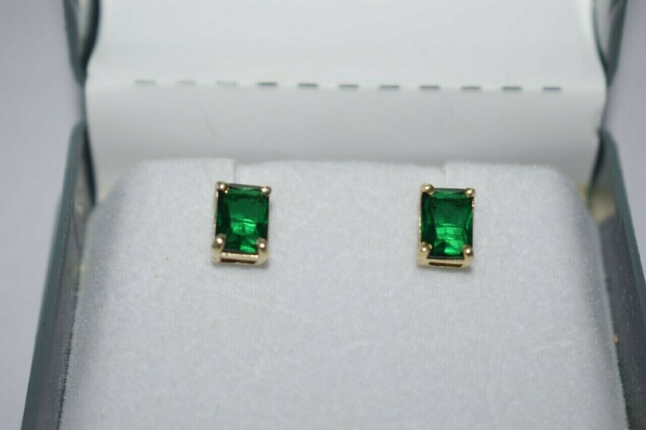 4.28CT Emerald Cut Green Emerald Solitaire Stud Earrings In 14K Yellow Gold Over